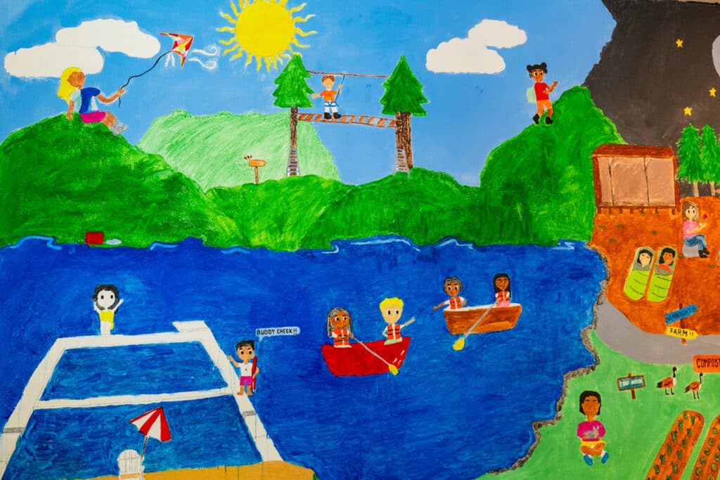 A mural that campers did depicting summer camp. 